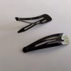 2 zwarte clips
